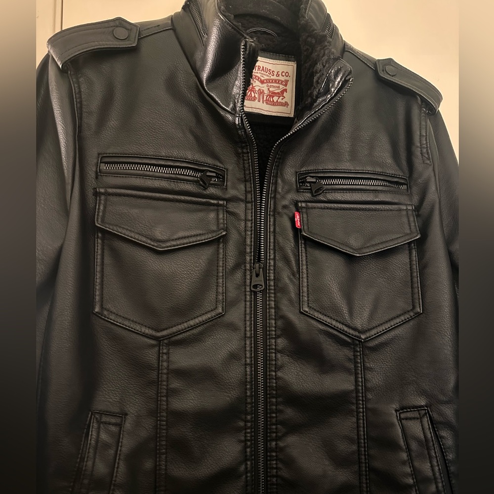 Levi’s black leather zip up jacket.